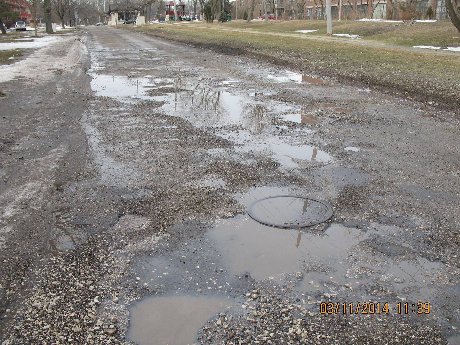 Cracked and Potholed Street
